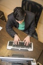 Young businessman in office desk using computer Royalty Free Stock Photo