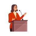 Young businessman or politician woman speaks into microphone standing behind podium Royalty Free Stock Photo