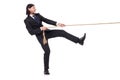 Young businessman pulling rope isolated Royalty Free Stock Photo