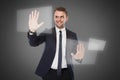 Young businessman push againts virtual screen Royalty Free Stock Photo