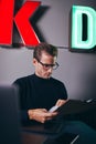 Young businessman reading documents at his desk in an office Royalty Free Stock Photo