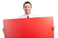 Young Businessman with red blank sign smiling Royalty Free Stock Photo