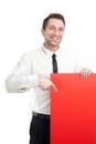 Young Businessman with red blank sign smiling Royalty Free Stock Photo