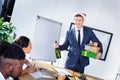 Businessman presenting gifts to colleagues Royalty Free Stock Photo