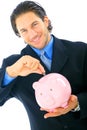 Young Businessman Saving Money Royalty Free Stock Photo