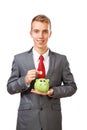 Young businessman saving money Royalty Free Stock Photo