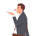 Young businessman sending a flying true love kiss, showing care, fondness and affection, a sincere Saint Valentine\'s message Royalty Free Stock Photo