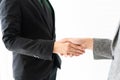 Young businessman shakes hands and agrees to cooperate in business. / business concept / cooperate work / successful job Royalty Free Stock Photo