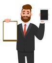 Young businessman showing blank clipboard and new brand digital tablet computer. Person holding notepad. Male character design.