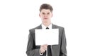 Young businessman showing a blank sheet.isolated on a white Royalty Free Stock Photo