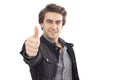 Young businessman showing OK sign with his thumb up Royalty Free Stock Photo