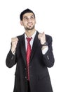 Young businessman showing thumb up in studio Royalty Free Stock Photo