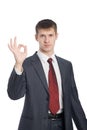 Young businessman shows gesture okay Royalty Free Stock Photo