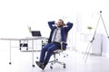 Young businessman sitting in comfortable office chair Royalty Free Stock Photo