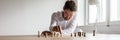 Young businessman sitting at his office desk planning