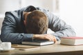 Man sleeping at desk