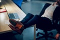 Young businessman sleeping on table. Royalty Free Stock Photo