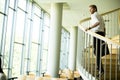 Young businessman on the stairs Royalty Free Stock Photo