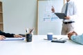 Young businessman stand in front of the group