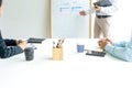 Young businessman stand in front of the group