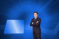 Young businessman standing crossarmed Royalty Free Stock Photo