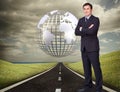 Young businessman standing crossarmed Royalty Free Stock Photo