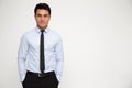 Young businessman standing with hands in pocket Royalty Free Stock Photo