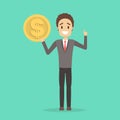 Young businessman standing and holding a coin Royalty Free Stock Photo