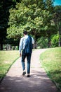 The businessman is walking in the park. Royalty Free Stock Photo