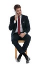 Young businessman in suit talking on the phone Royalty Free Stock Photo