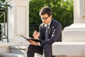 Young businessman taking notes Royalty Free Stock Photo