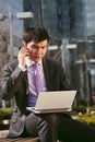 Young businessman talking on mobile phone. Royalty Free Stock Photo