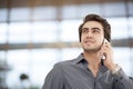 Young businessman talking mobile phone in the office Royalty Free Stock Photo