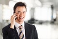 Young businessman talking at phone Royalty Free Stock Photo