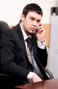 Young businessman talking phone Royalty Free Stock Photo