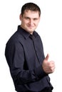 Young businessman thumb up