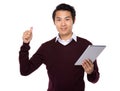 Young businessman thumb up sign with tablet computer Royalty Free Stock Photo