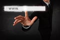 Young businessman touching web browser address bar with www sign Royalty Free Stock Photo