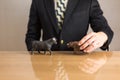 Trader sitting in front of wooden desk