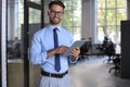 Young businessman using his tablet in the office Royalty Free Stock Photo