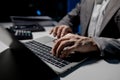 A young businessman is using a laptop to search for important information on business competitors, A laptop was used to access