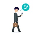 Young businessman walking with phone and call icon. Royalty Free Stock Photo