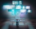 Businessman watching touch screens and computers on desk. Royalty Free Stock Photo