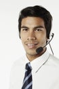 Young businessman wearing headset. Conceptual image Royalty Free Stock Photo