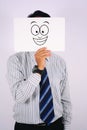 Young Businessman Wearing smile widely Mask isolated on white