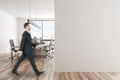 Young businessman in white office