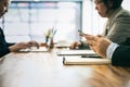 Young businessman work with mobile phones and notebooks in the office., business concept Royalty Free Stock Photo