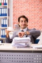 The young businessman working in the office Royalty Free Stock Photo