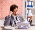 The young businessman working in the office Royalty Free Stock Photo