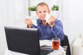 Young businessman working in the office, very concerned, a panic, crumpled paper Royalty Free Stock Photo